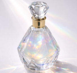 Midnight Spice perfume bottle with black cap and gold label on a dark background